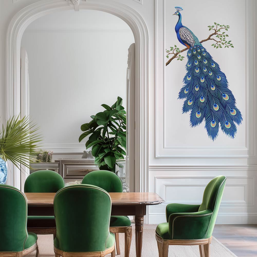Dining room with green chairs, wooden table, and peacock stencil on the wall.