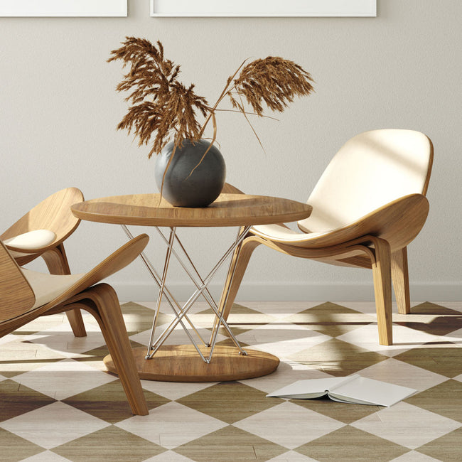 Modern wooden chairs and table with decorative elements in a room with checkered floor.