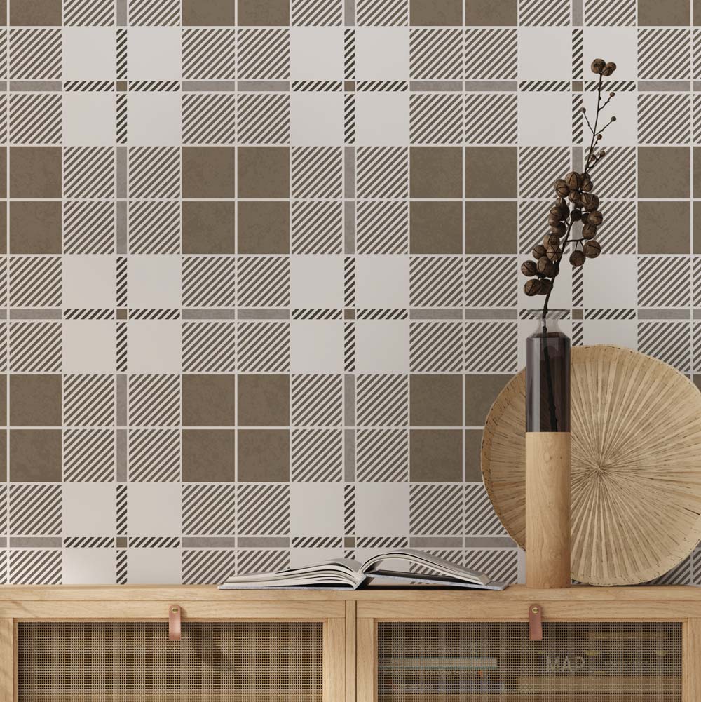 Tartan checkered wall stencil pattern with a vase and book on a wooden surface