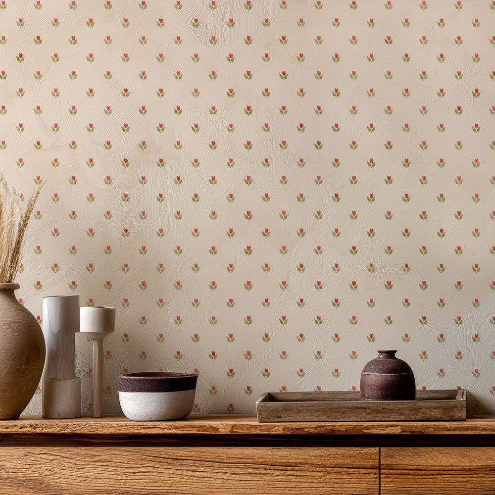 Decorative wall stencil with small floral pattern, wooden shelf with ceramic items.