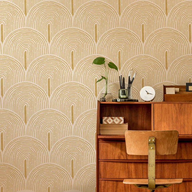 Wooden dresser against a wall with geometric stencil pattern