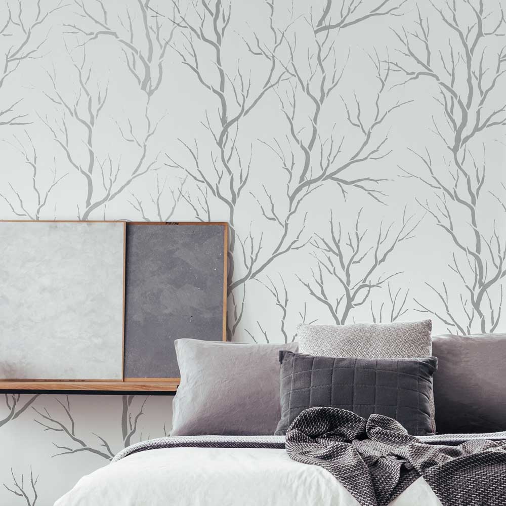 lemon branch wall stencil on gray wall in bedroom