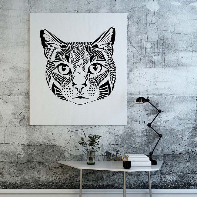 Cat face stencil grey wall