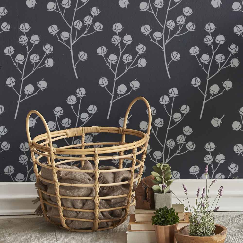 Close up of white cotton stencil on a dark wall