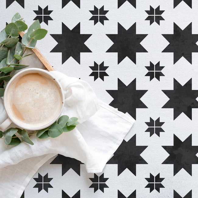 white and black stenciled floor quilted star tile floor coffee