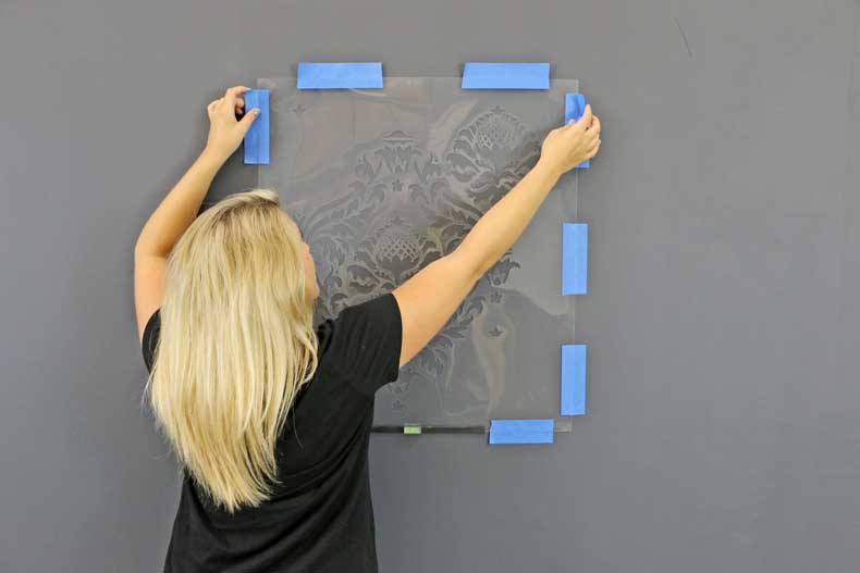 stenciled halloween skull feature wall placement