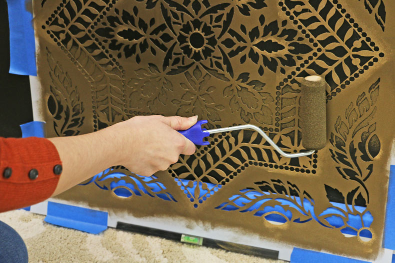 painting tile stencil on accent wall