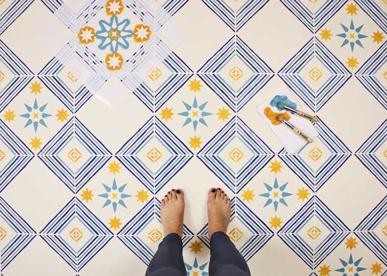 Tile stencil pattern painted on floor