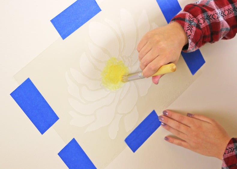 Painting over the floral wall stencil pattern