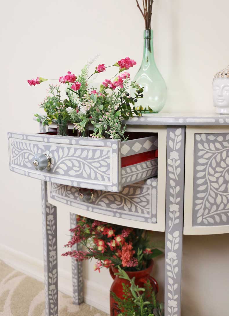 bone inlay stenciled table with drawer