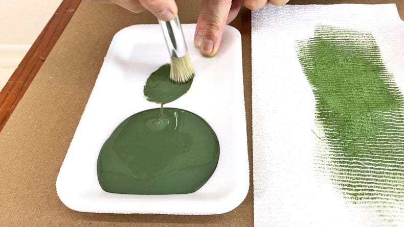 brush fro stenciling with green paint