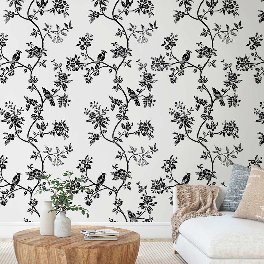 avian chinoiserie wall stencil in black on living room wall