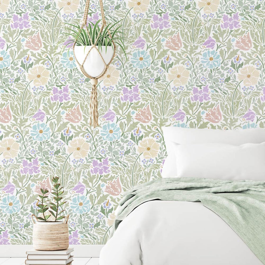 Bedroom with vintage william morris floral wall stencil and decorative plants