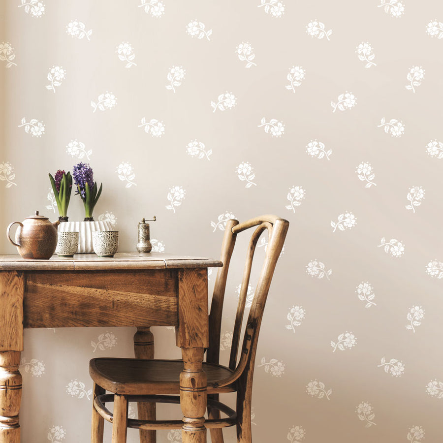 beige wall with white cottage pinks flower stencil 