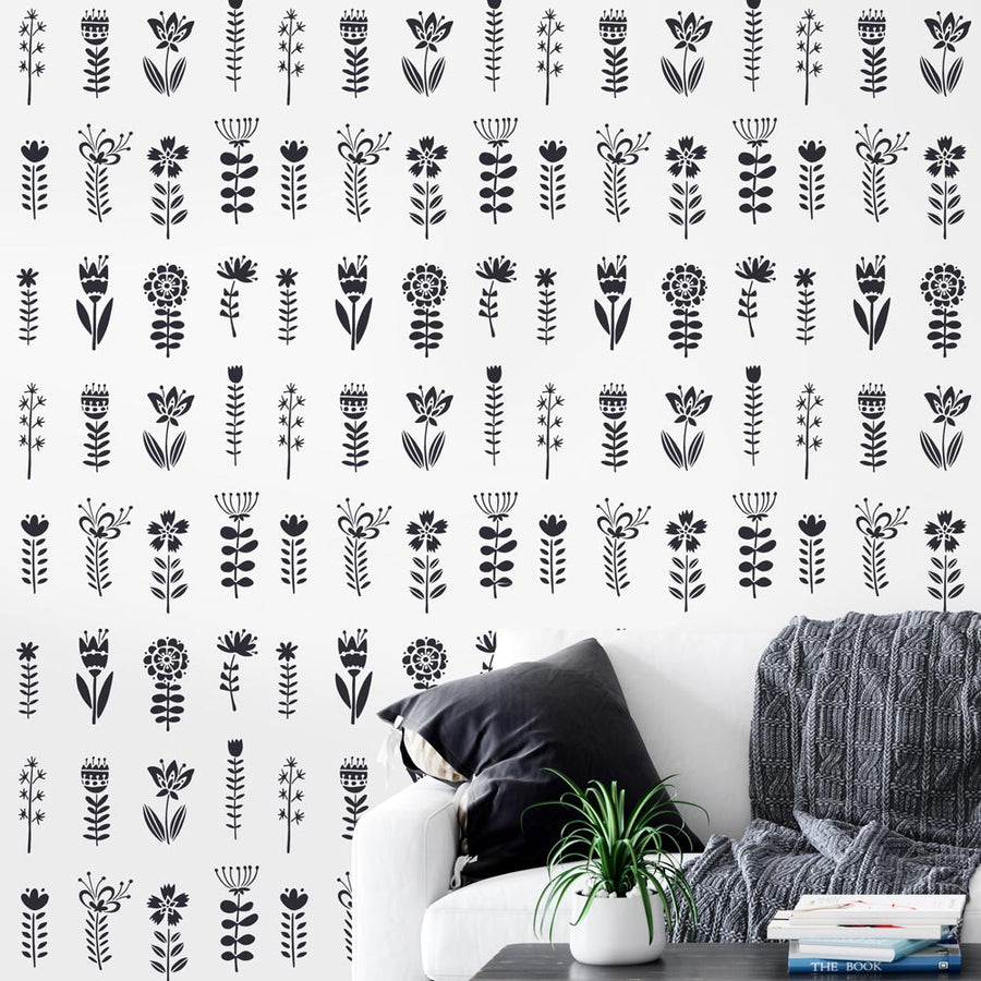 Folk Flowers Stencil Pattern in black and white on a living room wall