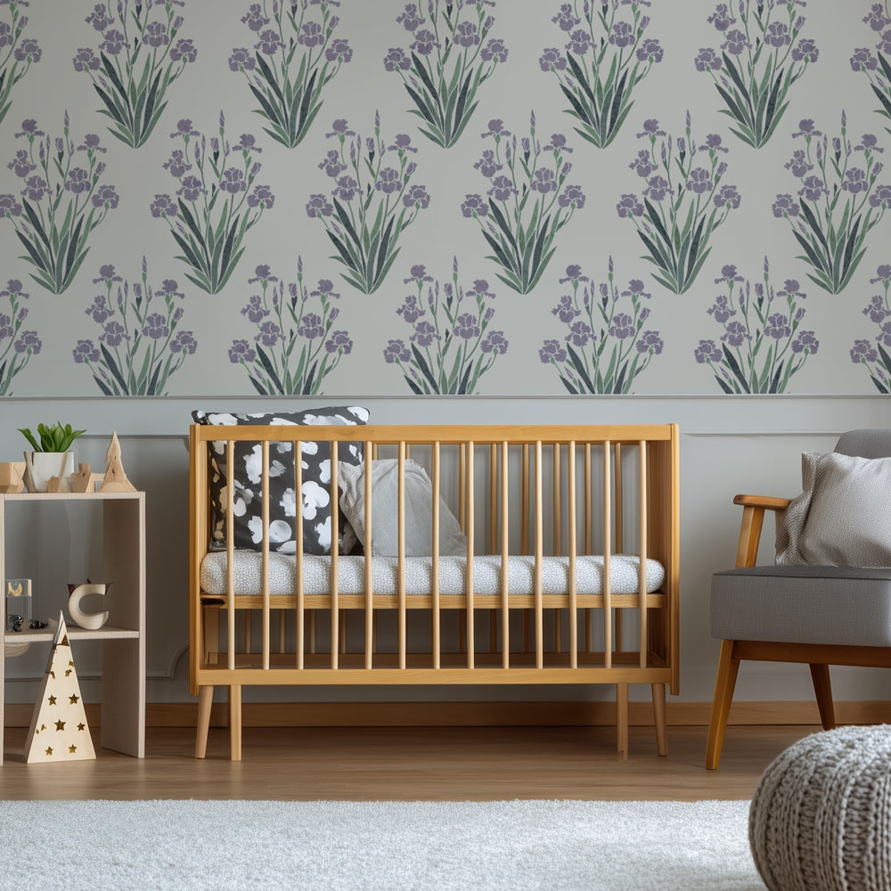 neutral nursery with a stenciled accent wall featuring purple iris