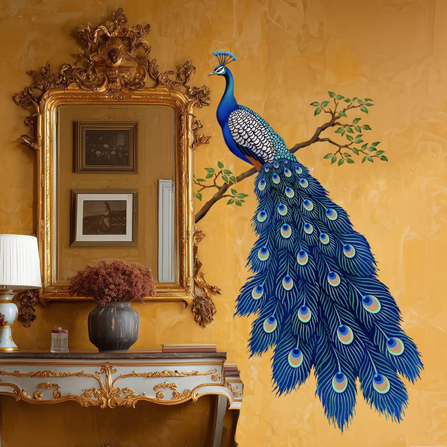 Decorative peacock wall stencil on a golden wall with ornate mirror and furniture.