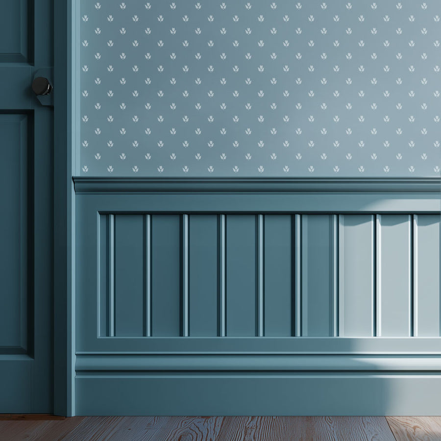 Wall with decorative paneling and patterned tiny tulip wall stencil