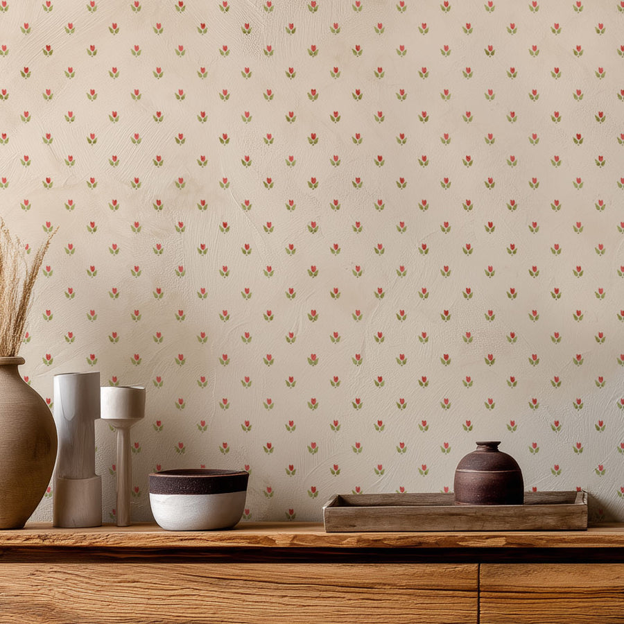 Decorative wall stencil with small floral pattern, wooden shelf with ceramic items.