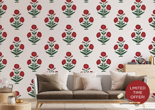 Living room with a floral patterned stenciled wall and a sofa.