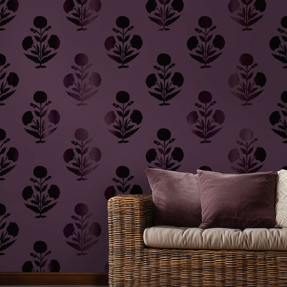 Wicker chair with purple cushions against a purple wall with floral turkish poppy wall stencil pattern