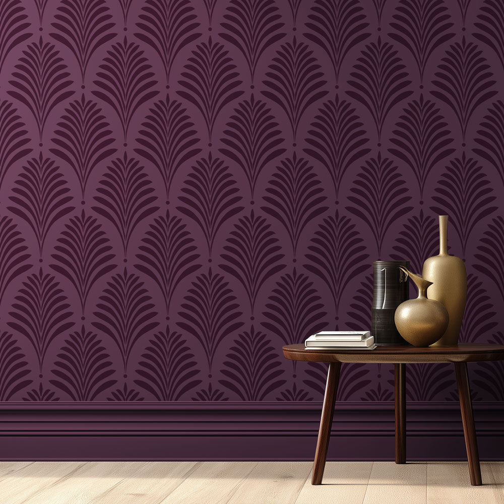 Purple patterned wall stencil with a wooden table and decorative items.