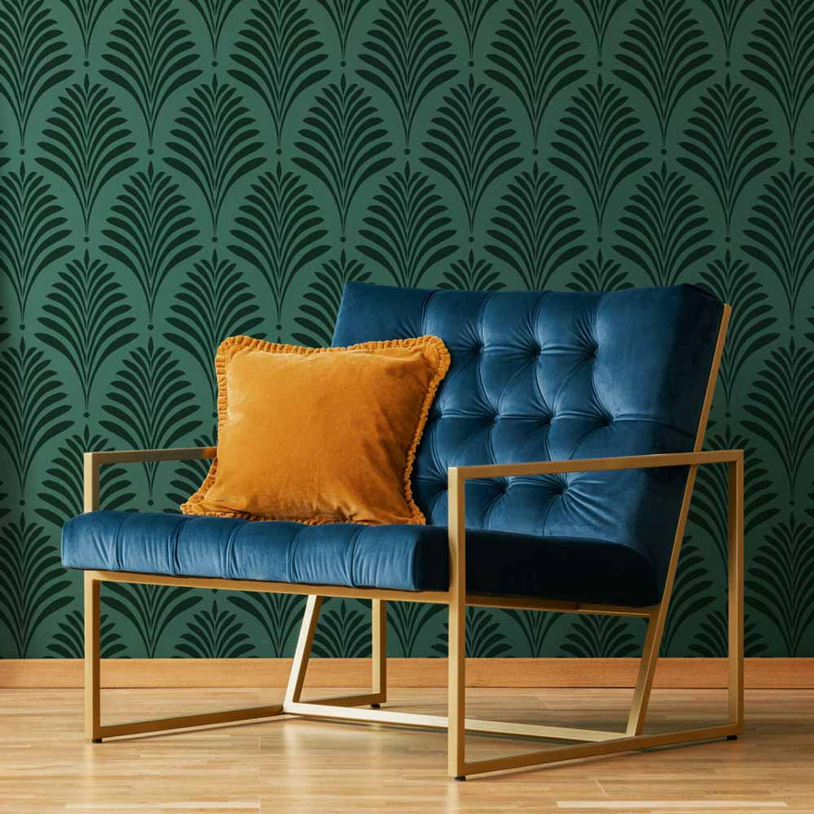 deco palms tropical wall stencil on a deep jewel toned green wall
