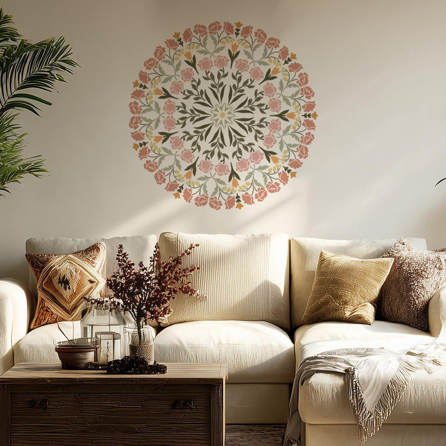 Living room with a stenciled floral mandala, beige sofa, and decorative items.