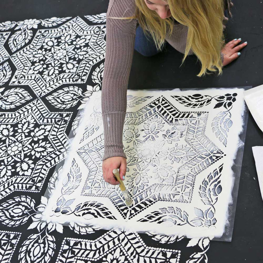 Stenciling the Alhambra tile Stencil on a Floor in Black and White