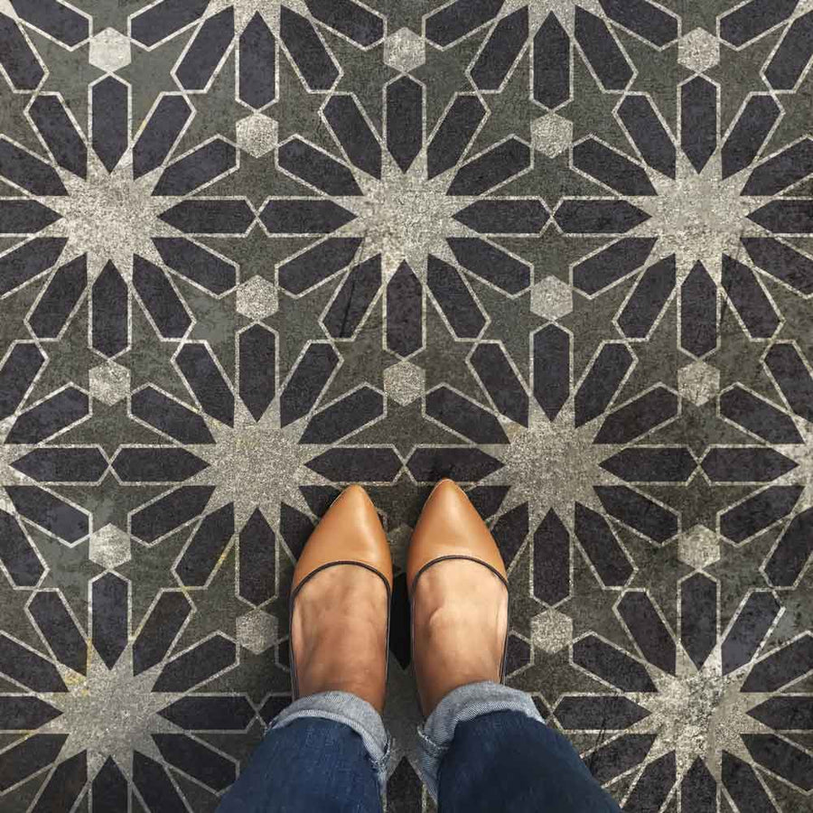 Star Palace Stenciled on a floor in dark grey