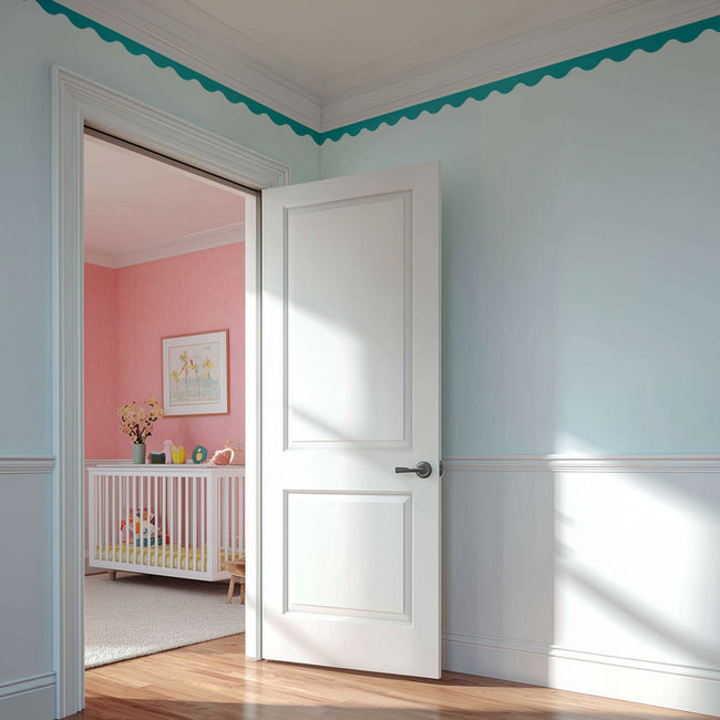 waves trim stenciled crown molding on a light blue wall